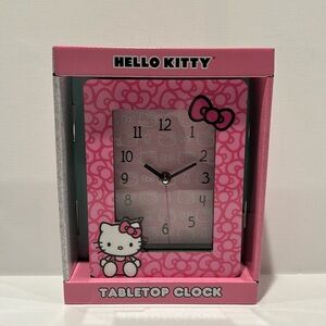 Hello Kitty Table Top Analog Display Clock. 1 AA Battery not included.